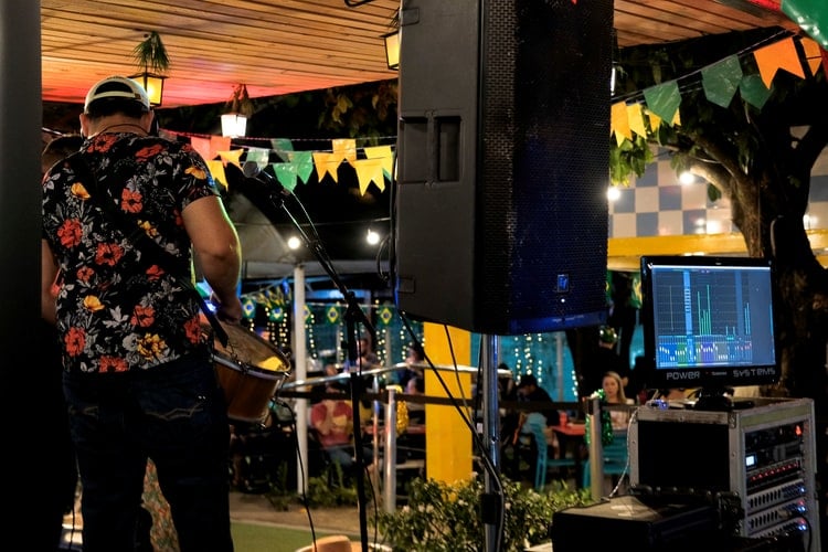 A musician playing for a crowd.