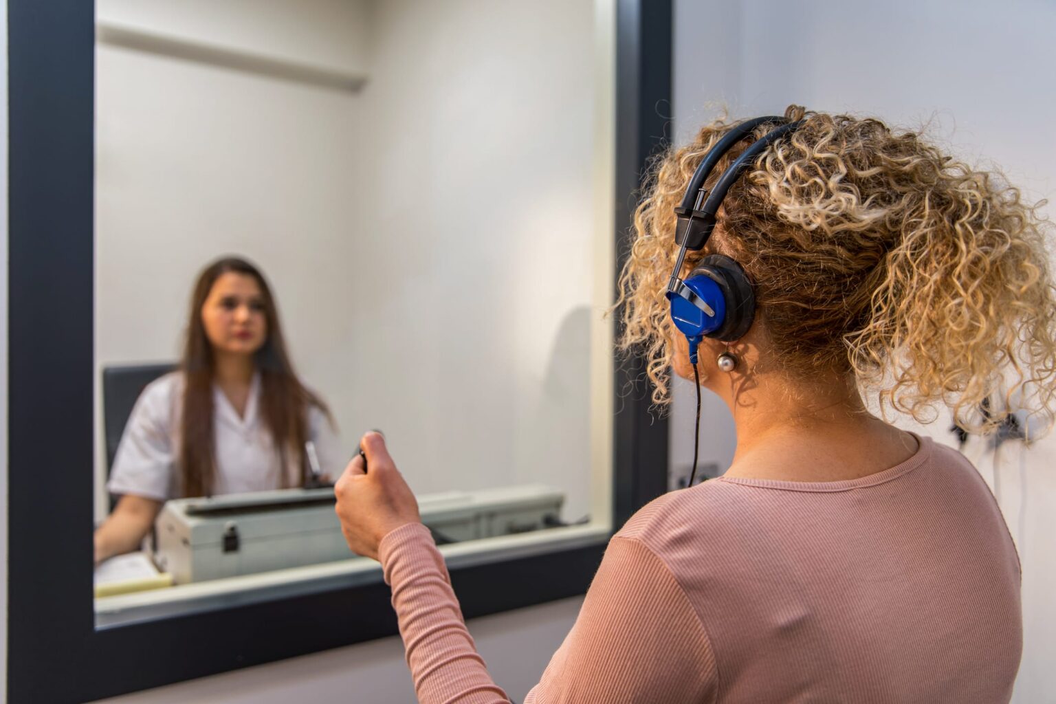 Woman getting a hearing test.